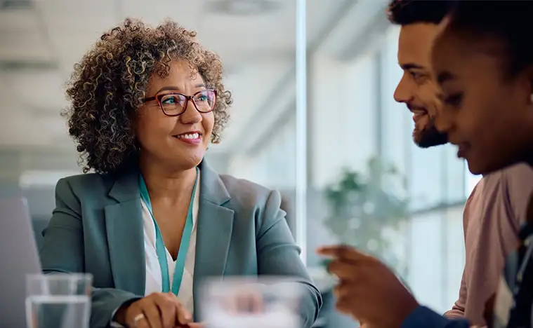 Agent offering an agreement to her clients.